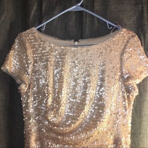 Sequined floor-length gown in champagne.